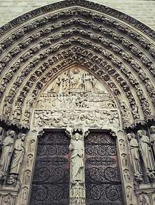 大教堂门法国巴黎母院门口雕刻了最后次判决的鼓背景