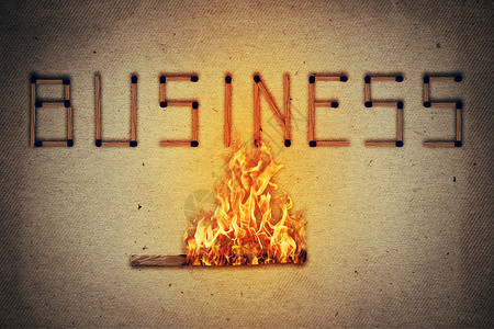 燃烧火柴点燃它的邻居,以商业文字的形式排列点燃火柴棒商业风险危险的象征图片