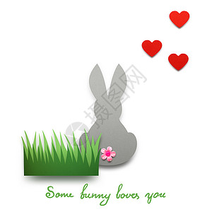 创意照片的兔子与心由纸白色背景图片
