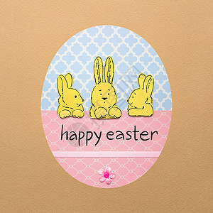 创意复活节照片三只兔子个彩色鸡蛋由纸棕色背景图片