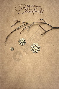 创意诞照片的树枝与雪花棕色背景图片
