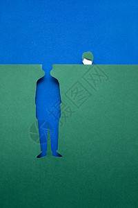 失了头蓝色绿色背景上用纸的人的创意照片图片