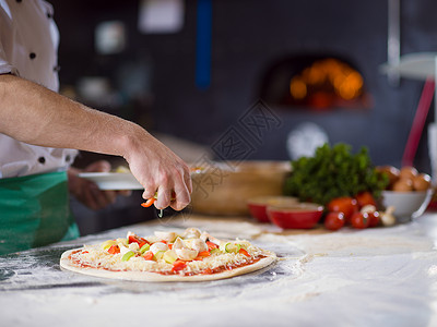 制作披萨新鲜的烹饪高清图片