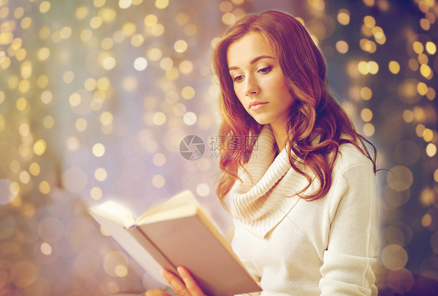 诞节,休闲人的轻的女人家看书轻的女人家看书图片