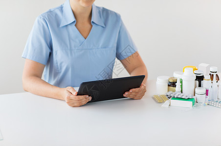 医学,医疗技术护士医生与药物平板电脑医院护士医生用药物片剂PC图片
