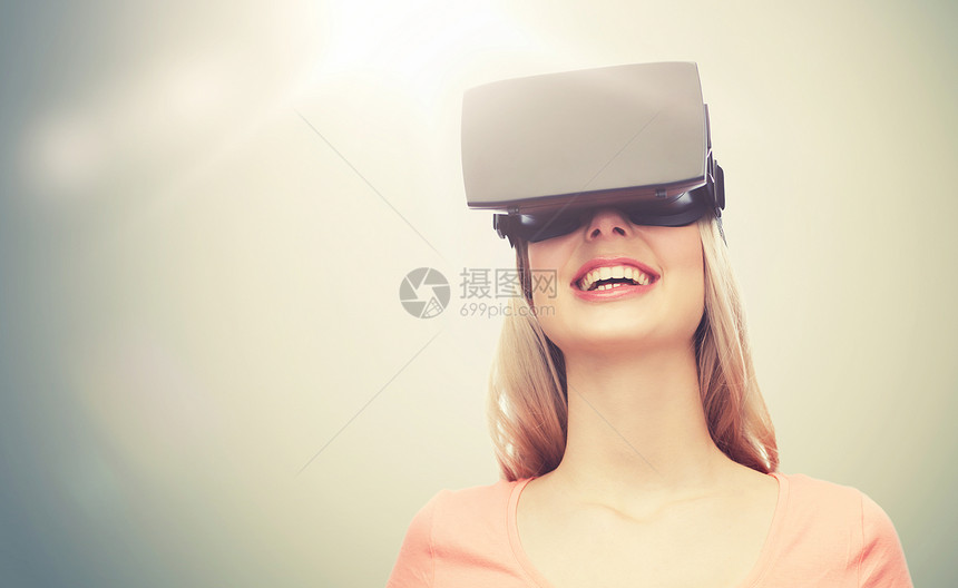 技术,虚拟现实,娱乐活动人的快乐的轻妇女与虚拟现实耳机3D眼镜灰色背景女虚拟现实耳机3D眼镜图片