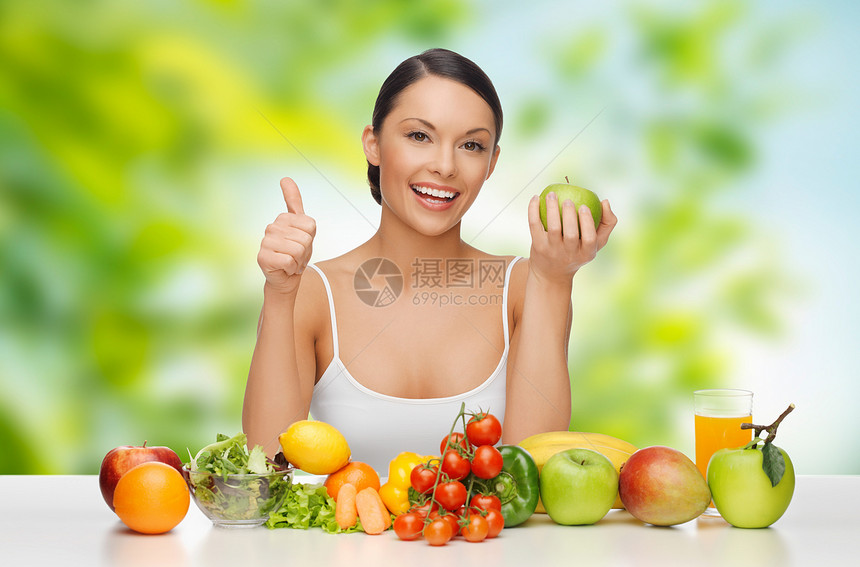 饮食,健康饮食人的女人与绿色苹果蔬菜拇指绿色的自然背景蔬菜食物的女人竖大拇指蔬菜食物的女人竖大拇图片