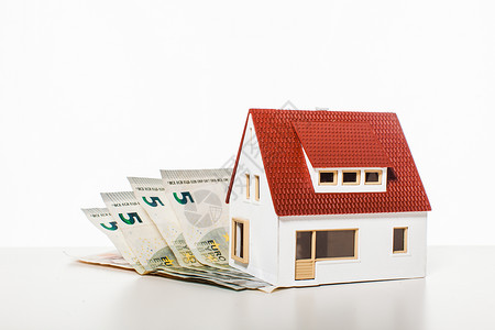 现金价值钞票上的房子财产阶梯抵押房地产投资的抵押贷款背景