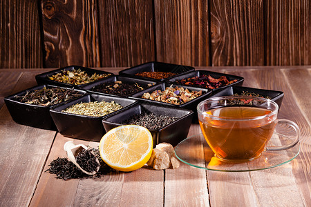 各种茶个黑色陶瓷碗个杯子与热饮料各种类型的茶高清图片