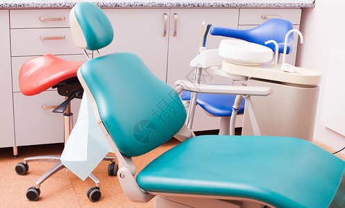 专业牙科椅CIN诊所牙医的工作地点牙科诊所的椅子背景图片