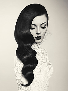 黑白花边分割黑白时尚工作室照片美丽的模特女孩黑发长发好莱坞浪潮的发型背景