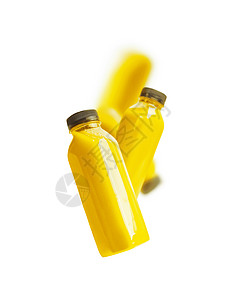 飞行黄色冰沙果汁瓶,隔离白色背景上品牌图片