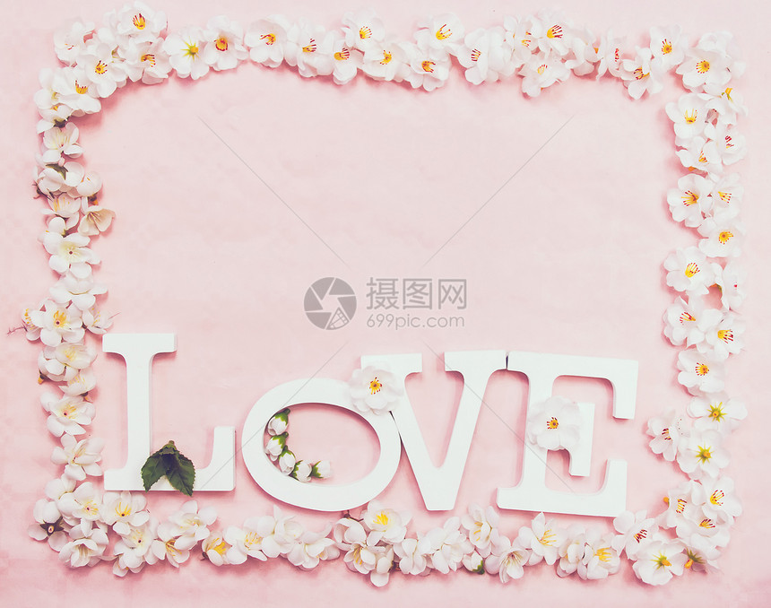 爱情词粉红色背景下的花框图片