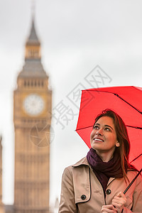 带着大本的红色雨伞度假的女孩轻女游客,伦敦英国大列颠图片