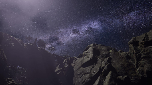 砂岩峡谷墙壁上的4k天体摄影星迹背景图片