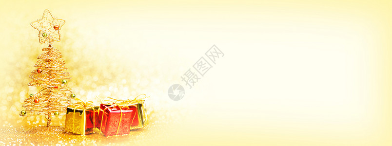 装饰金色玩具诞树金色背景上的礼物背景图片