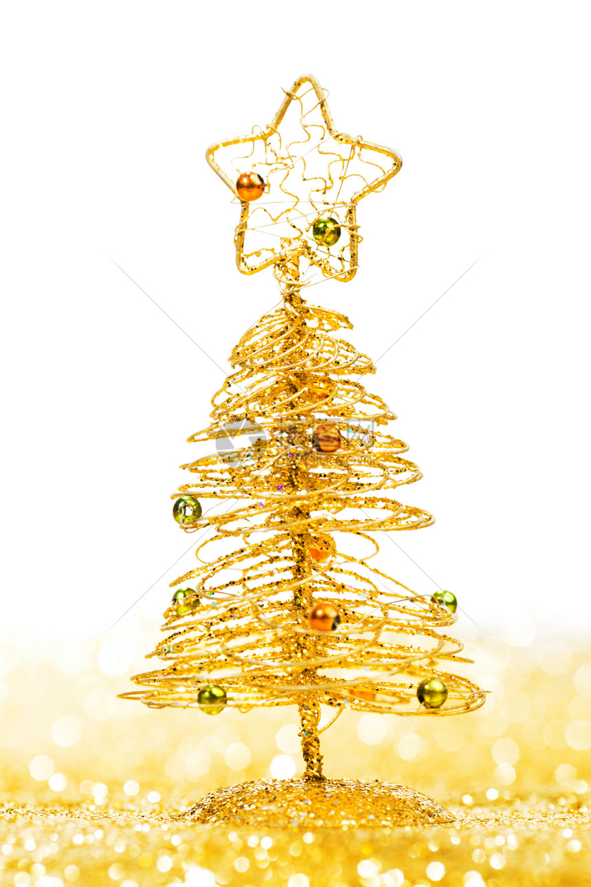美丽的金色装饰诞树金色闪光的背景与白色的图片