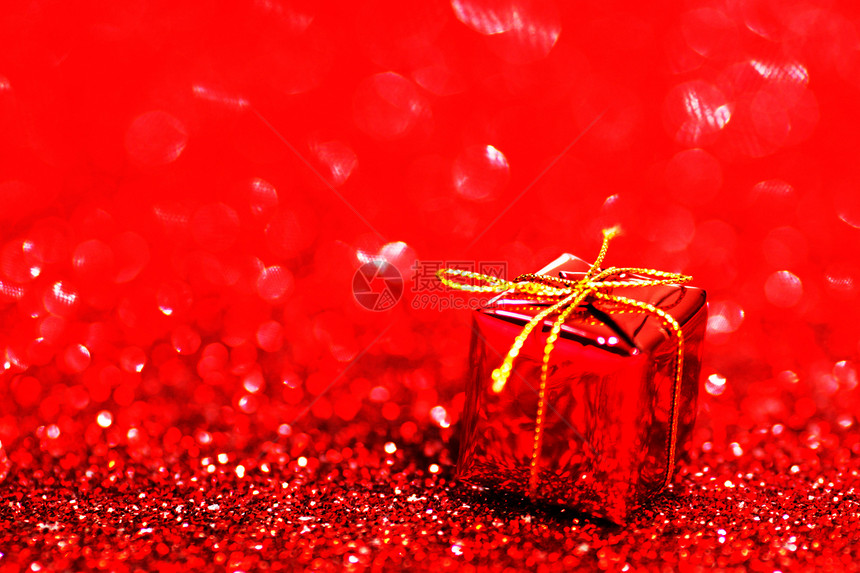 装饰红色盒子与节日礼物闪亮的闪光背景图片