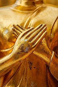 金佛像手闭Watphra,贴,泰国佛陀雕像双手靠近图片