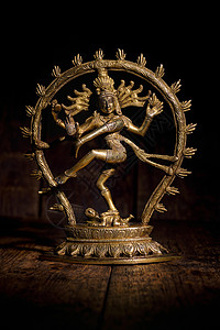 巴拉拉小魔仙印度印度教神湿婆纳塔拉亚雕像木制背景上的舞蹈之王湿婆纳塔拉亚雕像舞蹈之王背景
