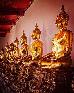 坐地方复古效果过滤了时尚风格的形象,坐佛教寺庙瓦佛,曼谷,泰国坐着佛像,泰国背景