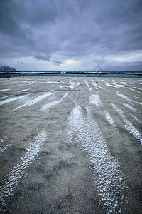 冬季挪威海峡湾的岩石海岸斯卡桑登海滩,洛芬岛,挪威挪威峡湾的岩石海岸图片