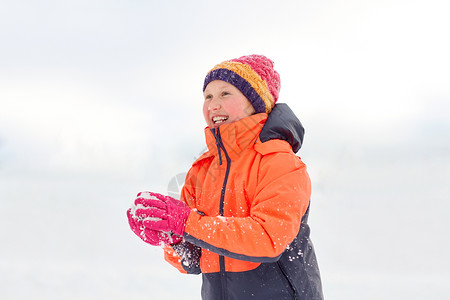 童,休闲季节的快乐的女孩冬天玩雪快乐的女孩冬天玩雪图片