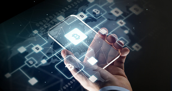 商业,加密货币未来的技术近距离与虚拟比特币区块链全息透明智能手机屏幕黑色背景与智能手机比特币亲密接触背景图片