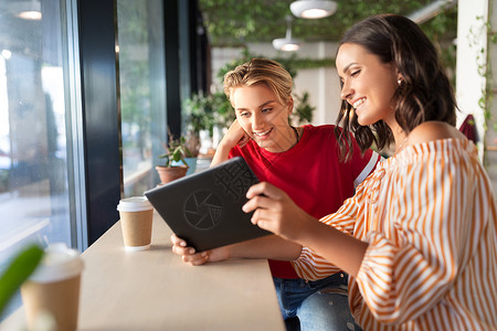 技术人的女朋友与平板电脑咖啡咖啡馆女朋友咖啡馆用平板电脑咖啡图片