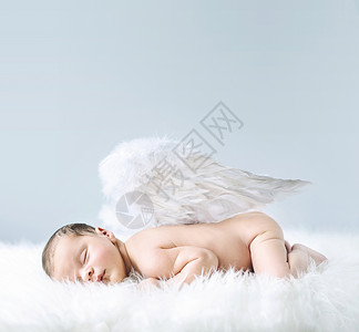 天使翅膀图片新生儿可爱的天使背景