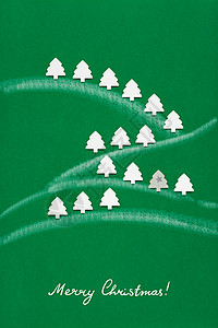 绿色背景纸制诞树的创意照片图片
