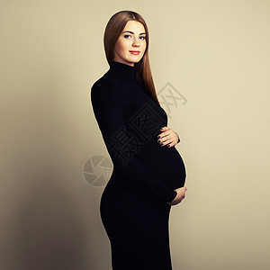 轻孕妇的肖像怀孕,爱,人期望的快乐的孕妇长发图片