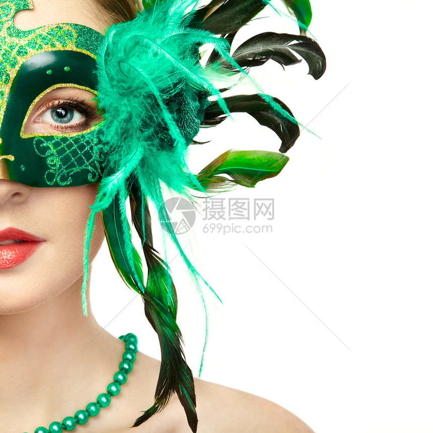 美丽的轻女人戴着神秘的绿色威尼斯具时尚照片假期庆祝活动图片