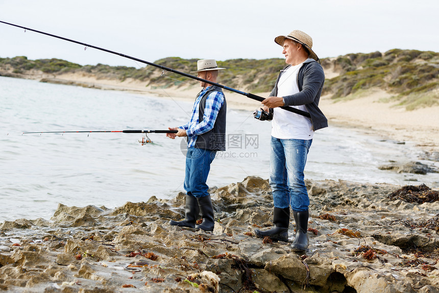 渔夫的照片渔民用鱼竿捕鱼的照片图片