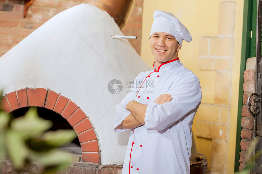 轻的男厨师厨房轻英俊的男厨师的形象图片