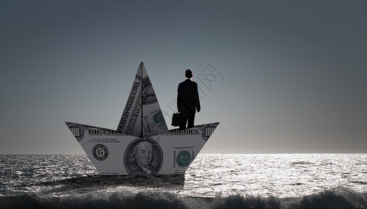 一海钱商人用美元钞票的船成功的商人金融海洋中乘船航行设计图片