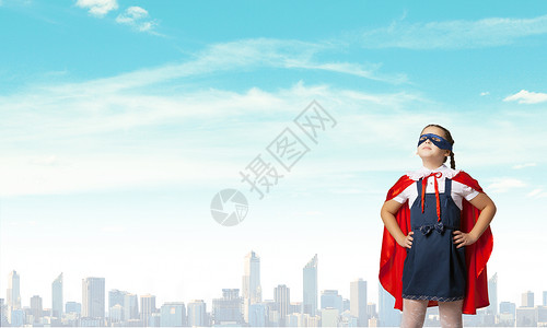 超级小子穿着超级英雄服装的学龄女孩背景图片