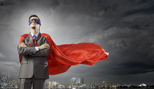 英雄风穿着超级英雄服装的轻人代表着力量勇气背景