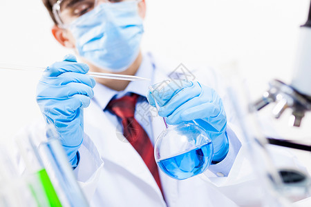 实验室化学测试的轻科学家以科学的名义背景图片