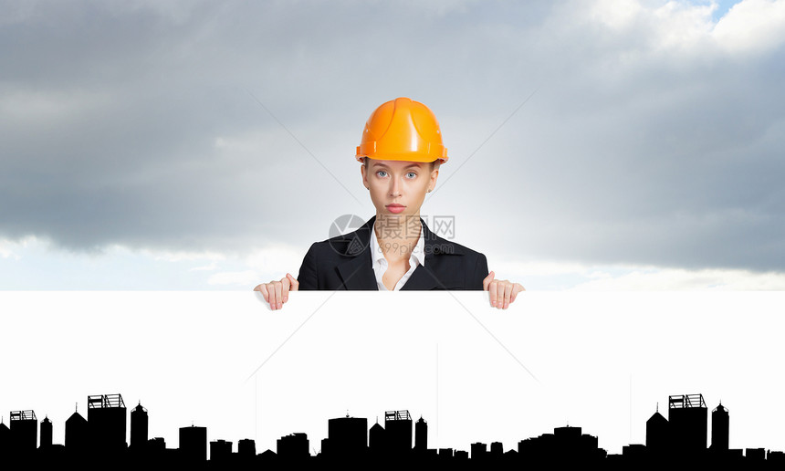 带横幅的女工程师吸引力的女建筑工人展示白色空白图片