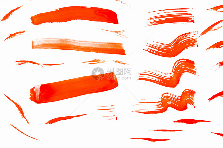油漆涂片白色背景上橙色油漆的抽象涂片图片