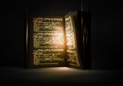 魔法书旧的黑色魔法书,灯高清图片