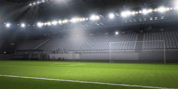 灯光下的足球场空足球绿场的背景图像背景图片