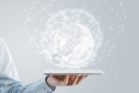 康塞特连接世界的技术商人手持平板电脑与全球连接设计图片
