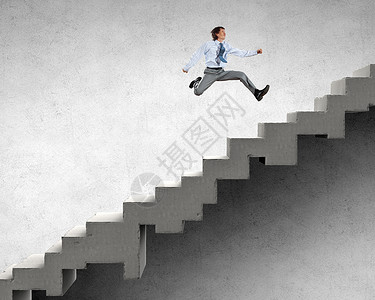 上升阶梯轻的商人走楼梯上,代表着成功的上职业阶梯背景