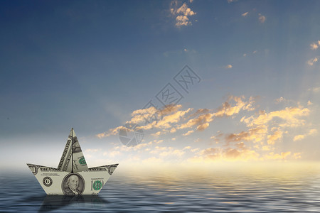 一海钱美元船水里用美元钞票制成的船浮水里设计图片