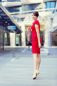 外女商人的肖像穿着红色连衣裙的漂亮商务女人的肖像图片