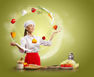 艺术大师变戏法的女厨师杂耍女亚洲厨师的颜色背景背景