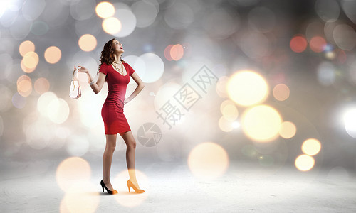 穿红色衣服的女人穿着红色连衣裙的女人波克的背景下图片