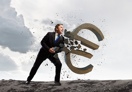 货币轻商人打破石头欧元标志货币图片